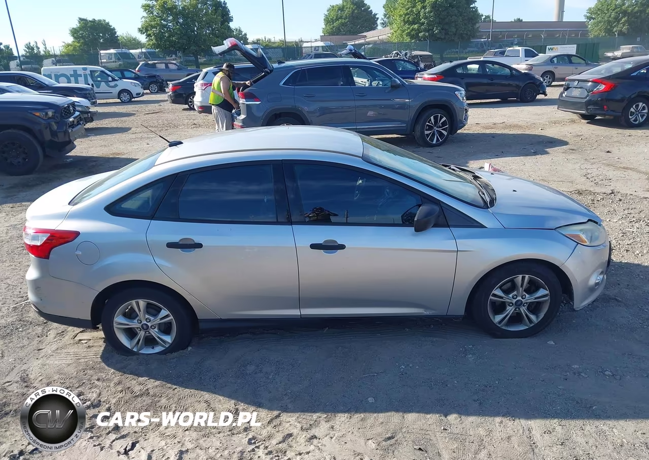 2013 Ford Focus S VIN:1FADP3E26DL180636 - 13