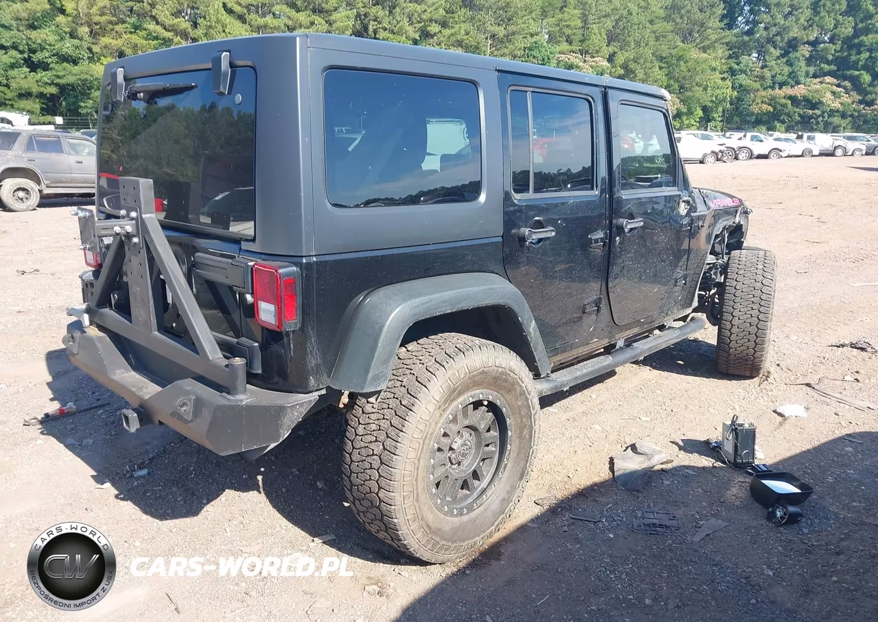 2015 Jeep Wrangler Unlimited Sport VIN:1C4BJWDG1FL506945 - 4