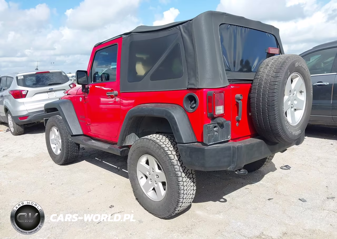 2015 Jeep Wrangler Sport VIN:1C4GJWAG6FL698115 - 3