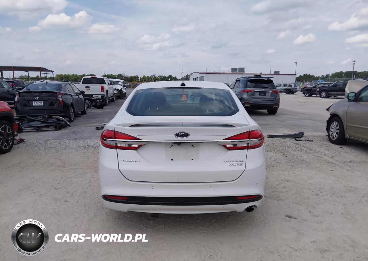 2017 Ford Fusion Hybrid Titanium VIN:3FA6P0RU9HR286136 - 16