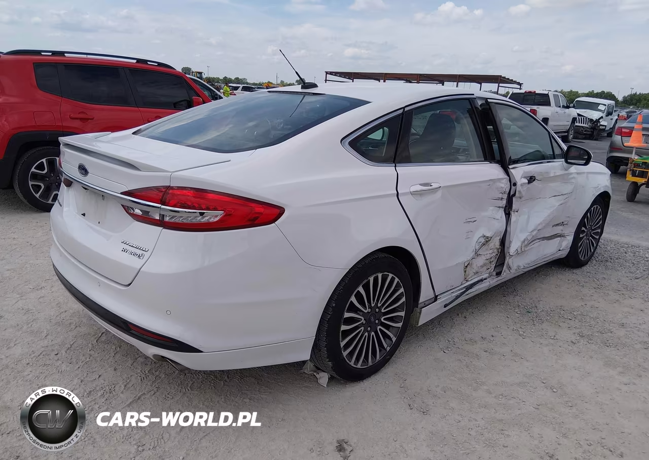 2017 Ford Fusion Hybrid Titanium VIN:3FA6P0RU9HR286136 - 4