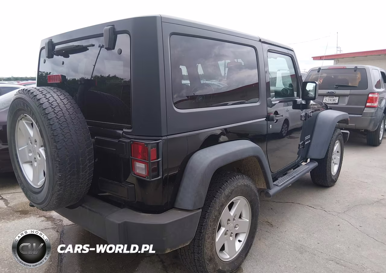 2013 Jeep Wrangler Sport VIN:1C4AJWAG7DL590427 - 4