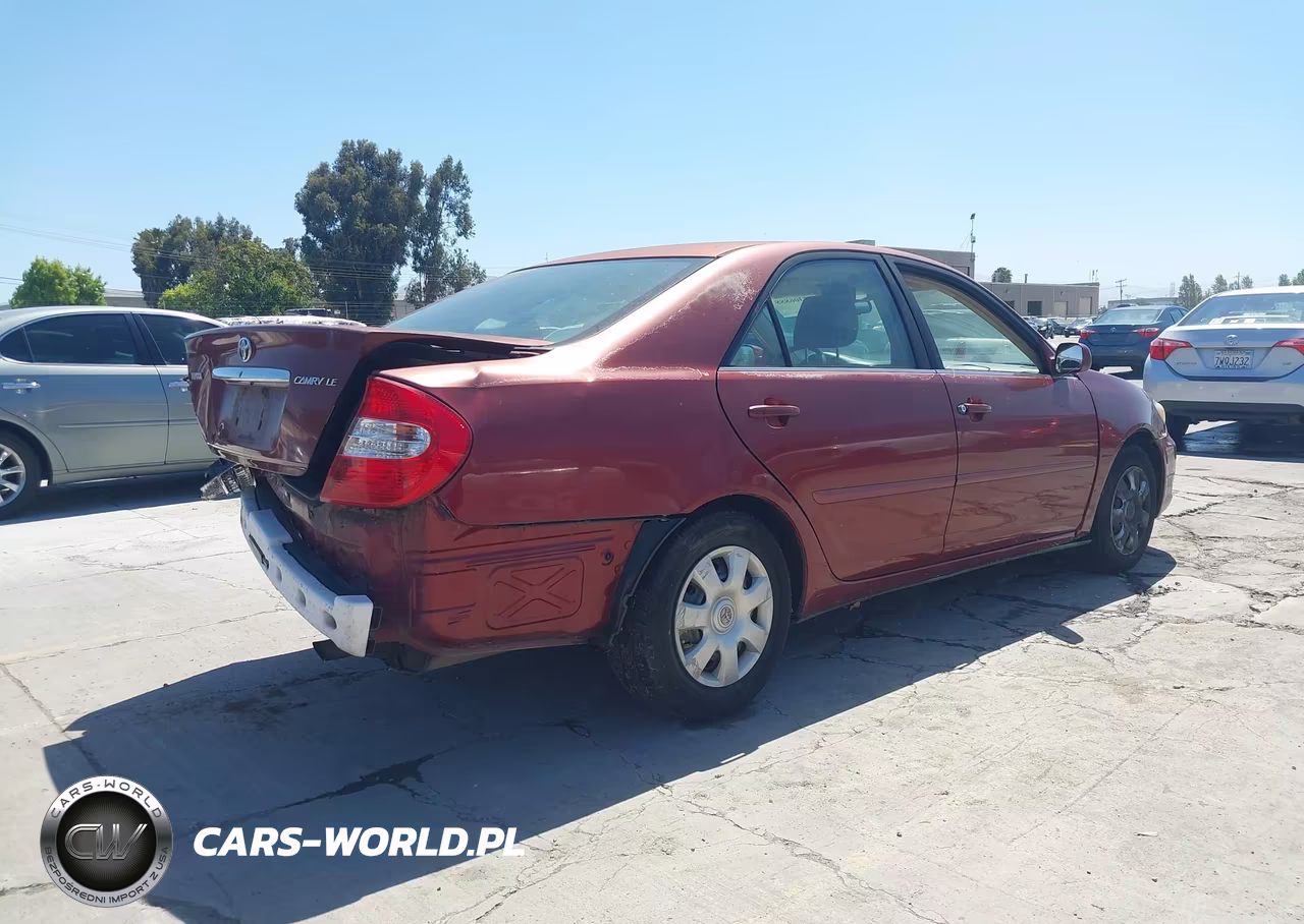 2002 Toyota Camry Le VIN:4T1BE32KX2U080666 - 4