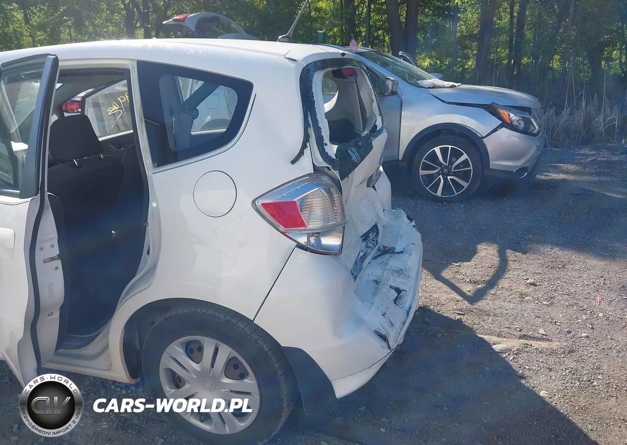 2009 Honda Fit VIN:JHMGE88259S038022 - 6