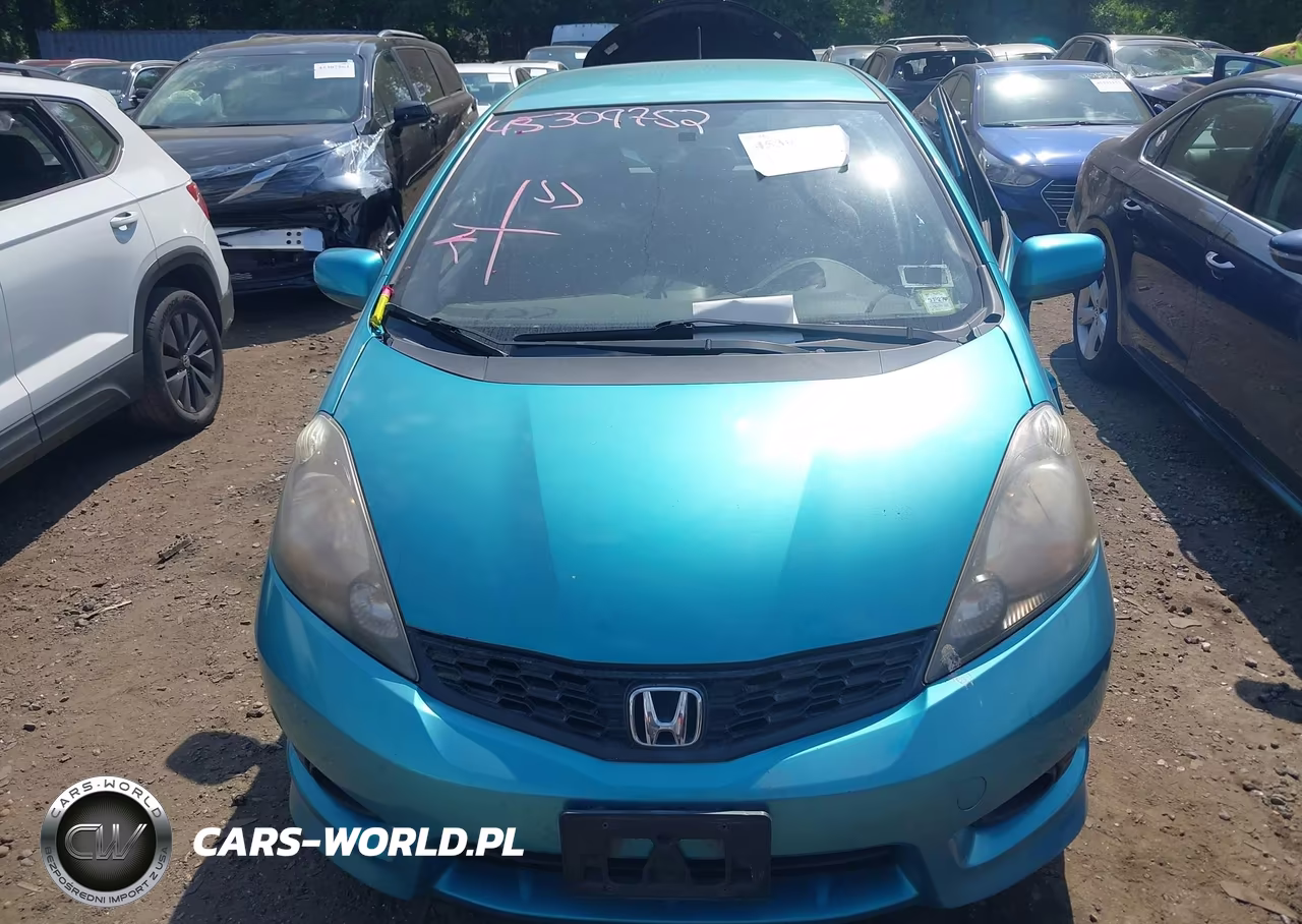 2013 Honda Fit Sport VIN:JHMGE8H59DC062370 - 12