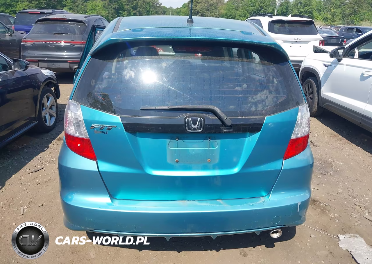 2013 Honda Fit Sport VIN:JHMGE8H59DC062370 - 16