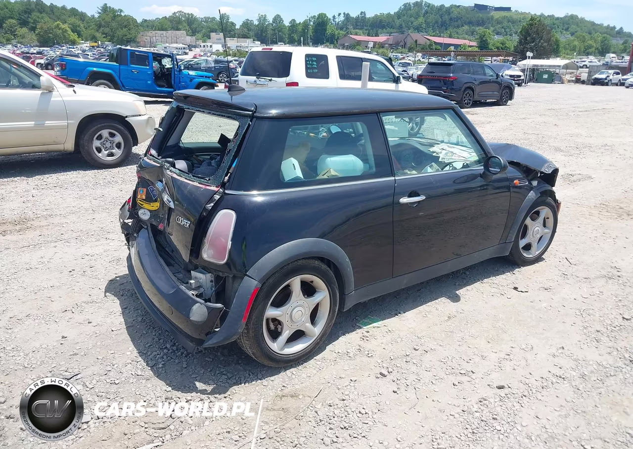2005 Mini Cooper VIN:WMWRC33505TJ71132 - 4