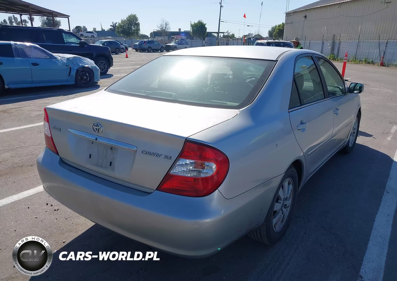 2003 Toyota Camry Xle VIN:4T1BE30K23U671238 - 4