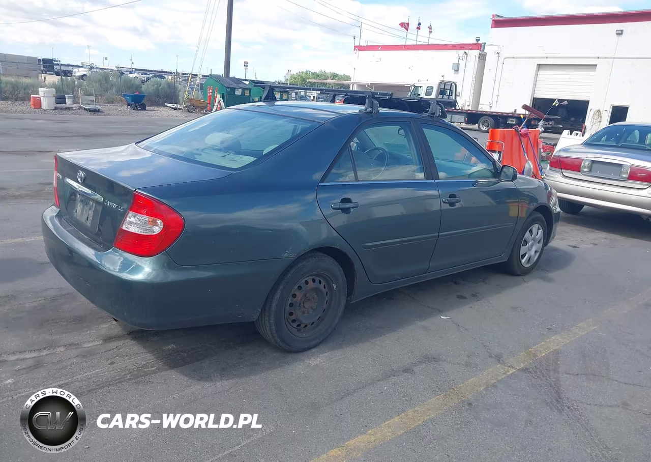 2004 Toyota Camry Le VIN:JTDBE32K140275344 - 4