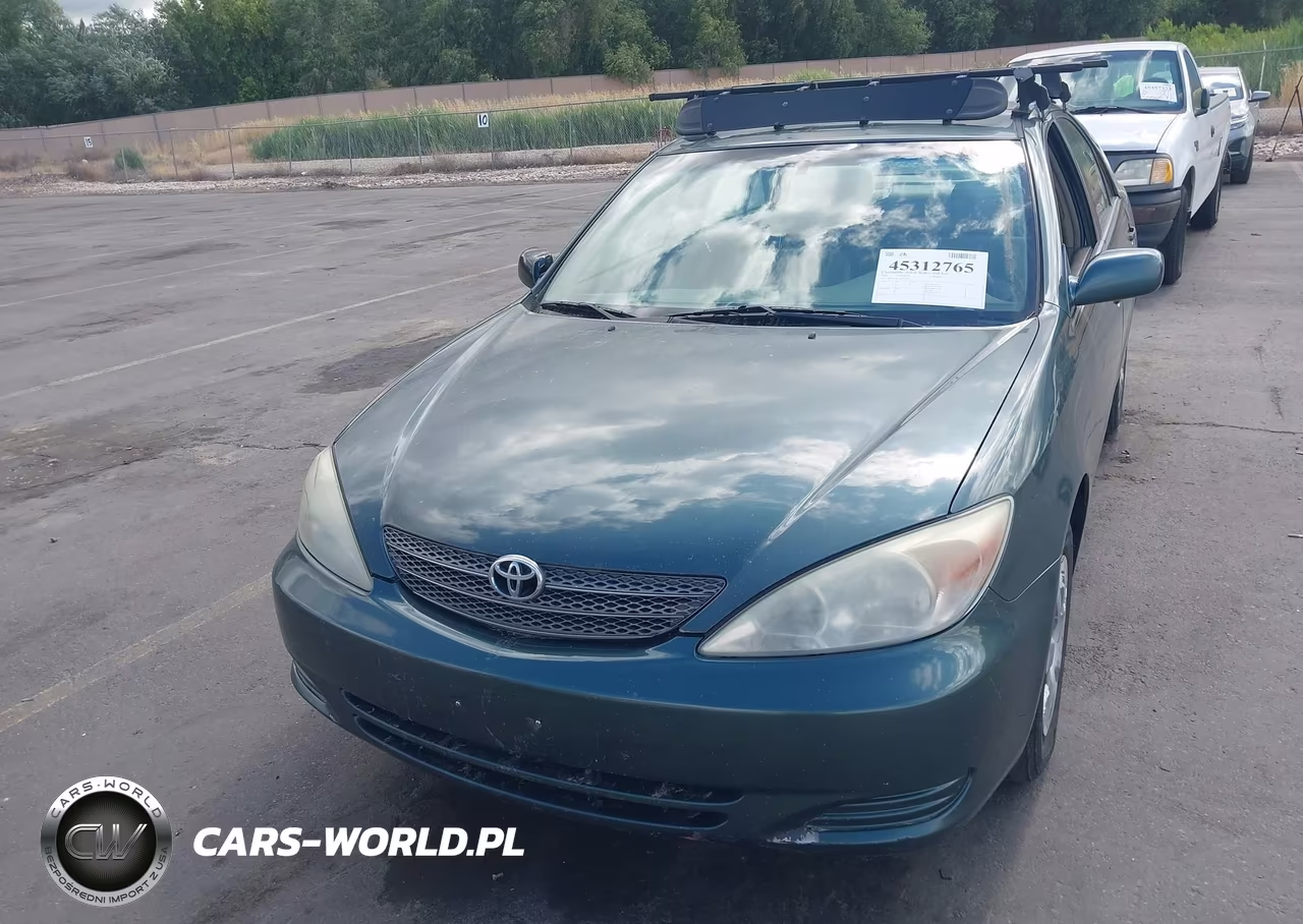 2004 Toyota Camry Le VIN:JTDBE32K140275344 - 6