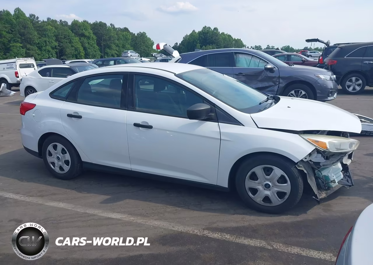 2016 Ford Focus S VIN:1FADP3E26GL339448 - 13
