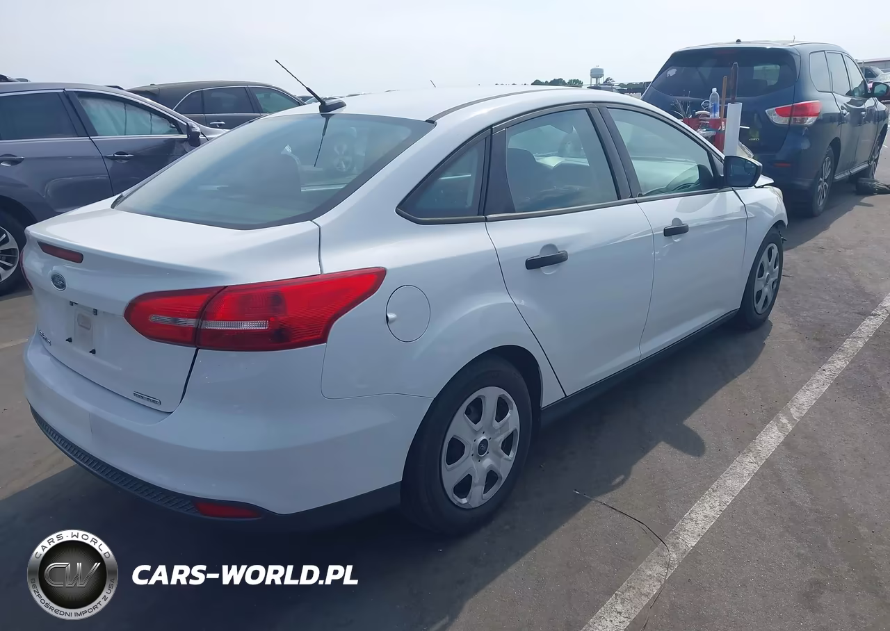 2016 Ford Focus S VIN:1FADP3E26GL339448 - 4