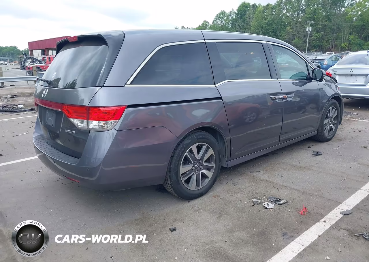 2015 Honda Odyssey Touring-Touring Elite VIN:5FNRL5H94FB070173 - 4