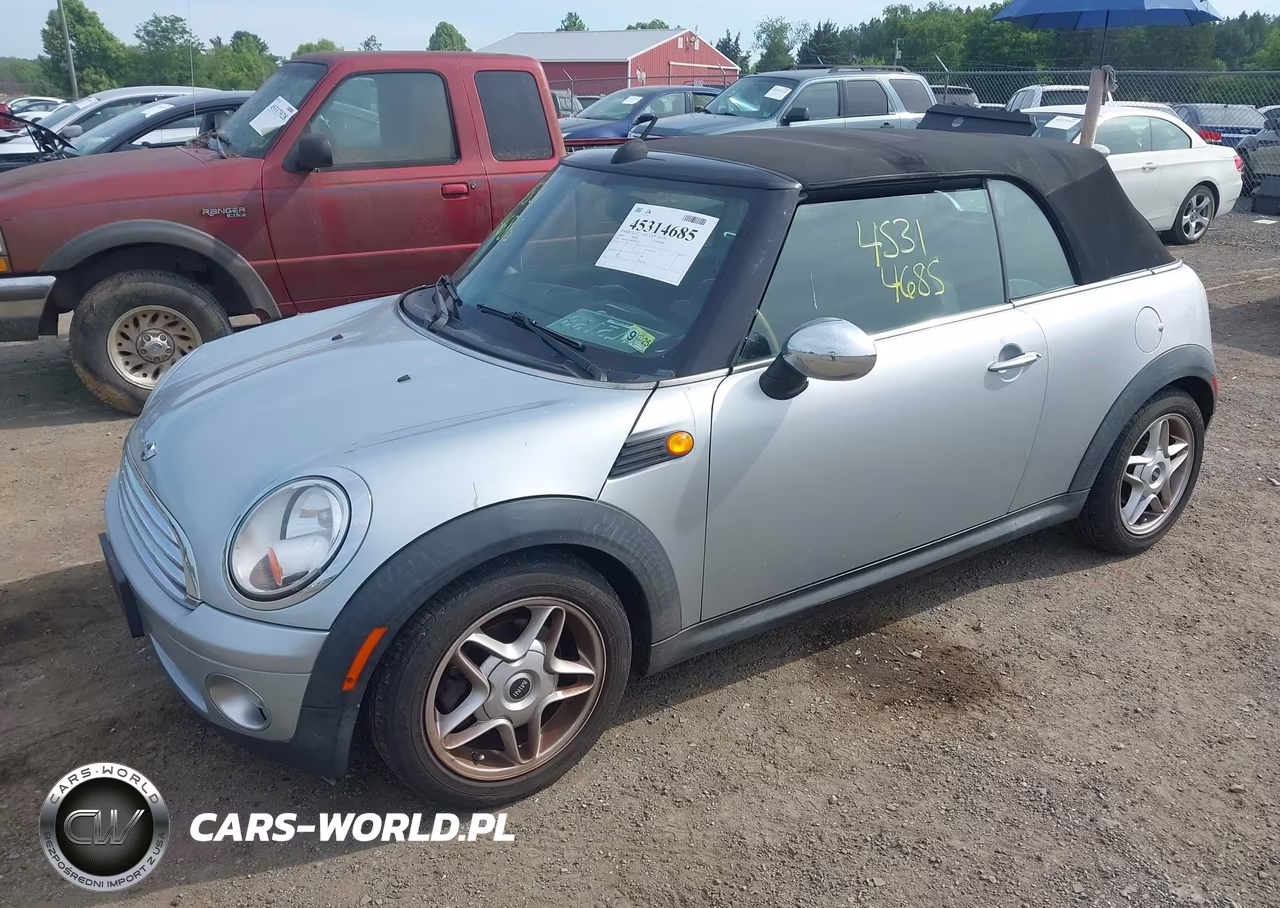 2009 Mini Cooper VIN:WMWMR33599TU95713 - 2