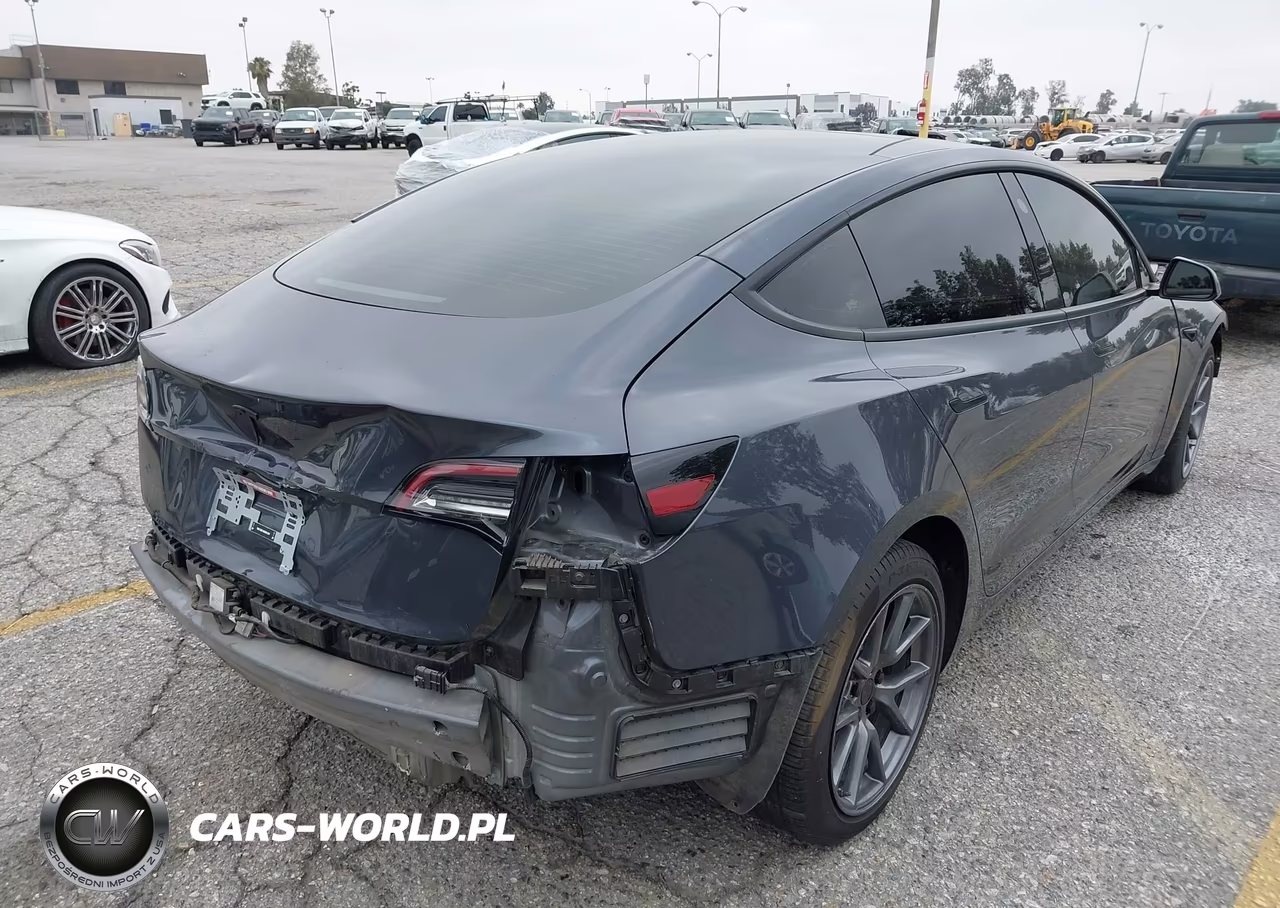 2023 Tesla Model 3 Rear-Wheel Drive VIN:5YJ3E1EAXPF409754 - 4
