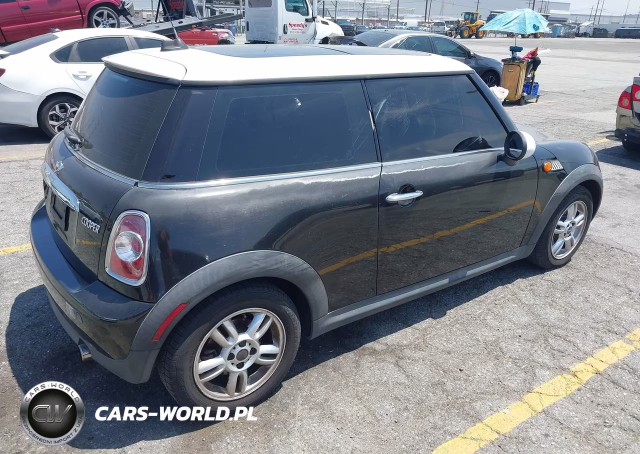 2011 Mini Cooper VIN:WMWSU3C5XBTX95840 - 4