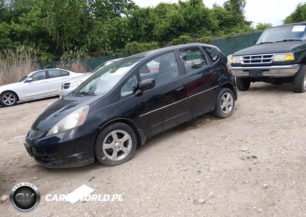 2009 Honda Fit VIN:JHMGE88279S036692 - 2