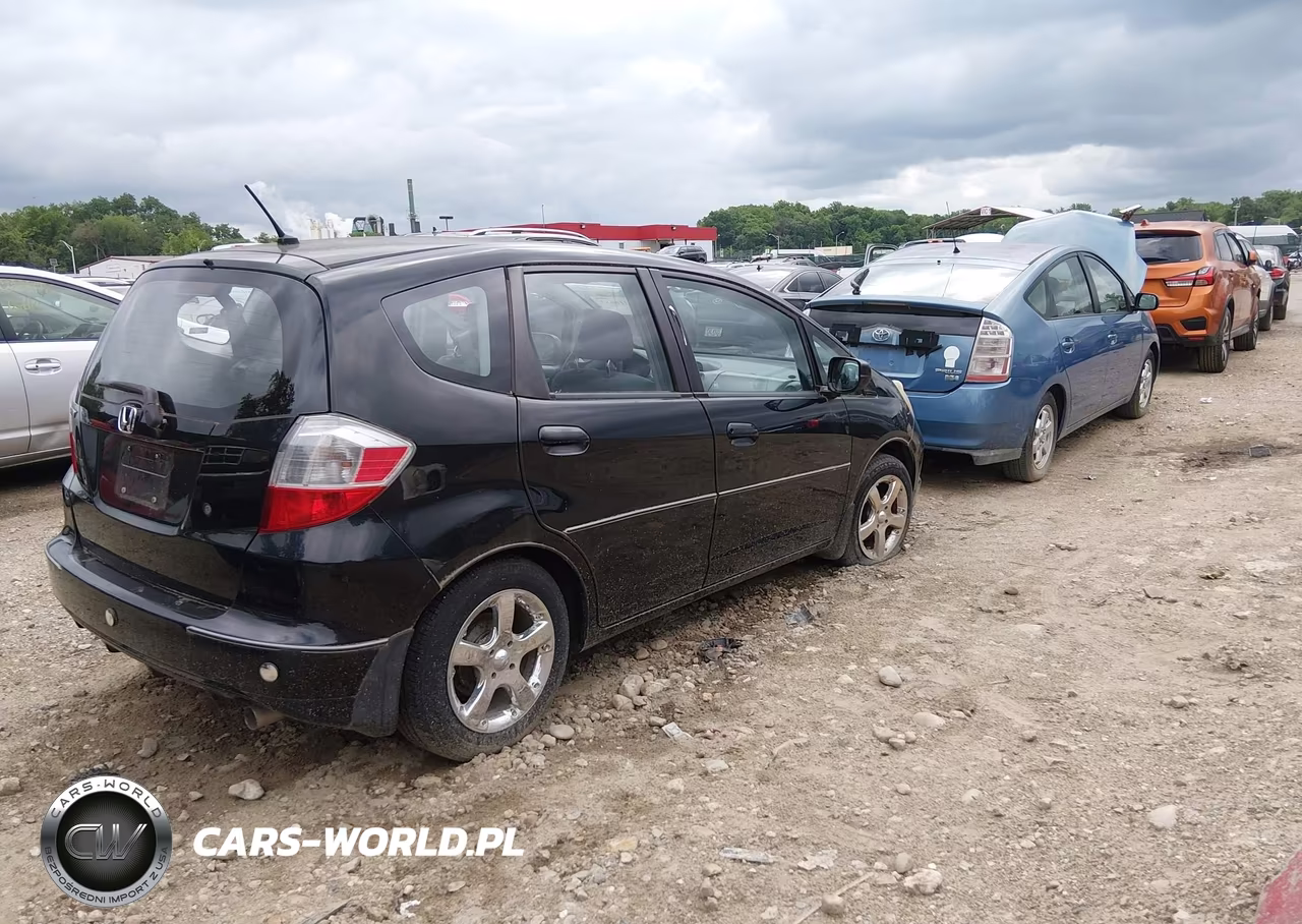 2009 Honda Fit VIN:JHMGE88279S036692 - 4