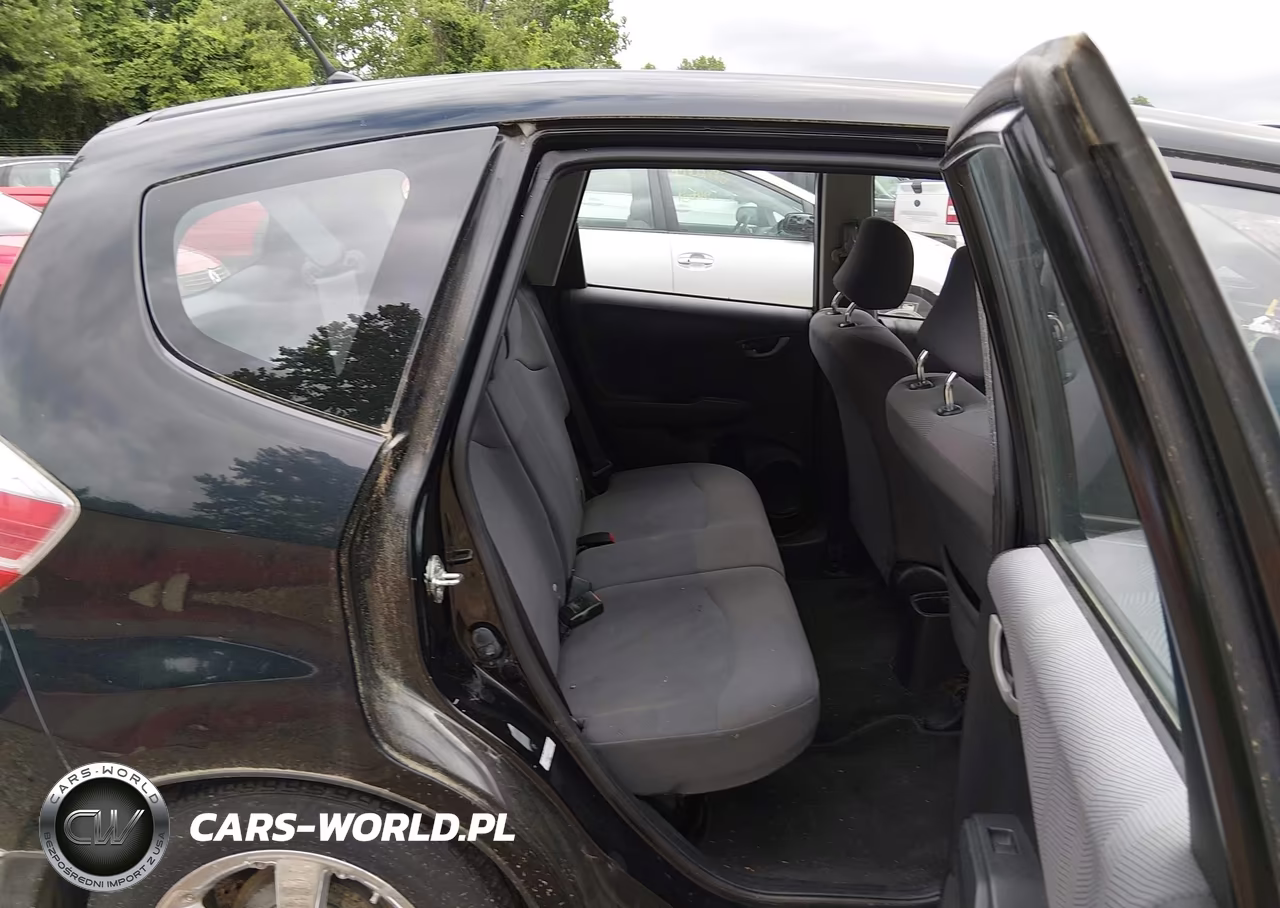 2009 Honda Fit VIN:JHMGE88279S036692 - 8