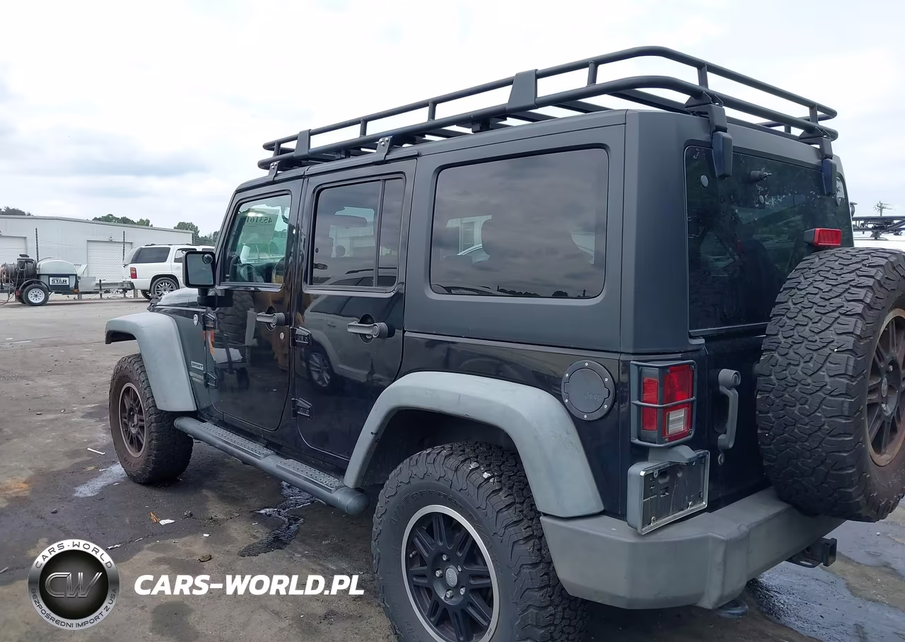 2011 Jeep Wrangler Unlimited Sport VIN:1J4BA3H17BL574871 - 14