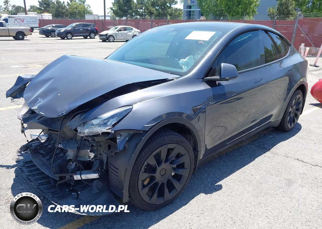 2023 Tesla Model Y Awd-Long Range Dual Motor All-Wheel Drive VIN:7SAYGDEE4PA028874 - 2