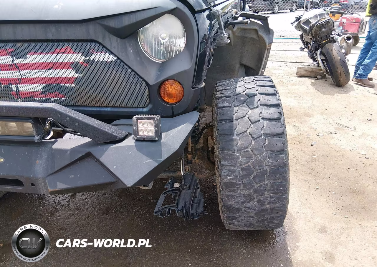 2012 Jeep Wrangler Unlimited Sport VIN:1C4BJWDG8CL208470 - 18