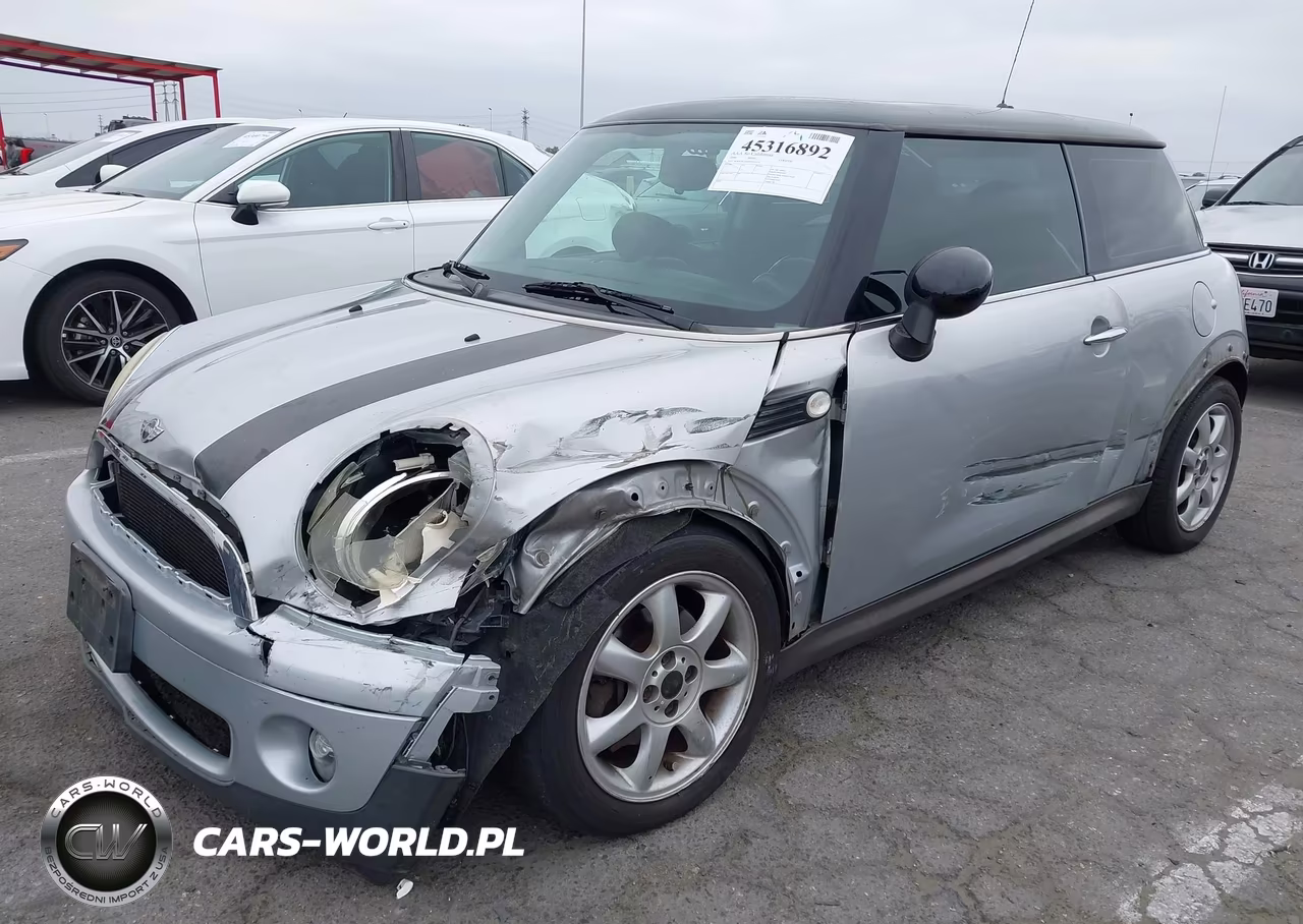2009 Mini Cooper VIN:WMWMF33589TW72518 - 6