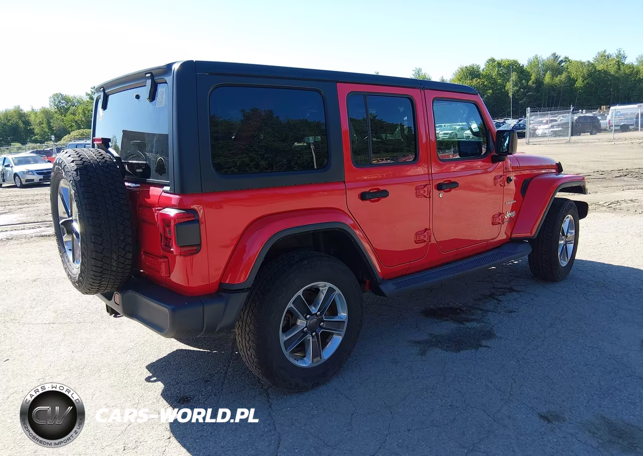 2019 Jeep Wrangler Unlimited Sahara 4X4 VIN:1C4HJXEG6KW571541 - 4