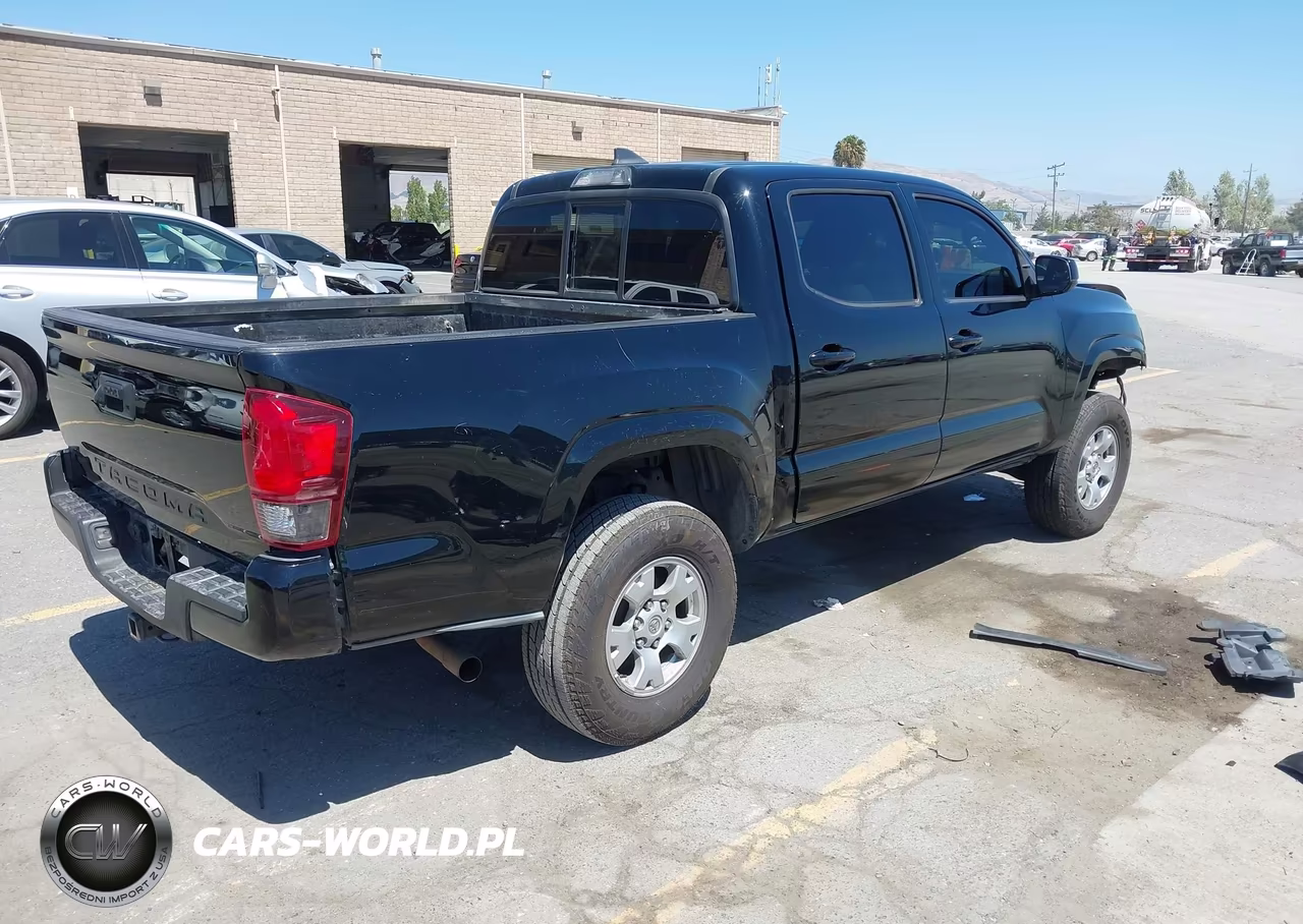 2018 Toyota Tacoma Sr VIN:5TFAX5GN3JX121175 - 4