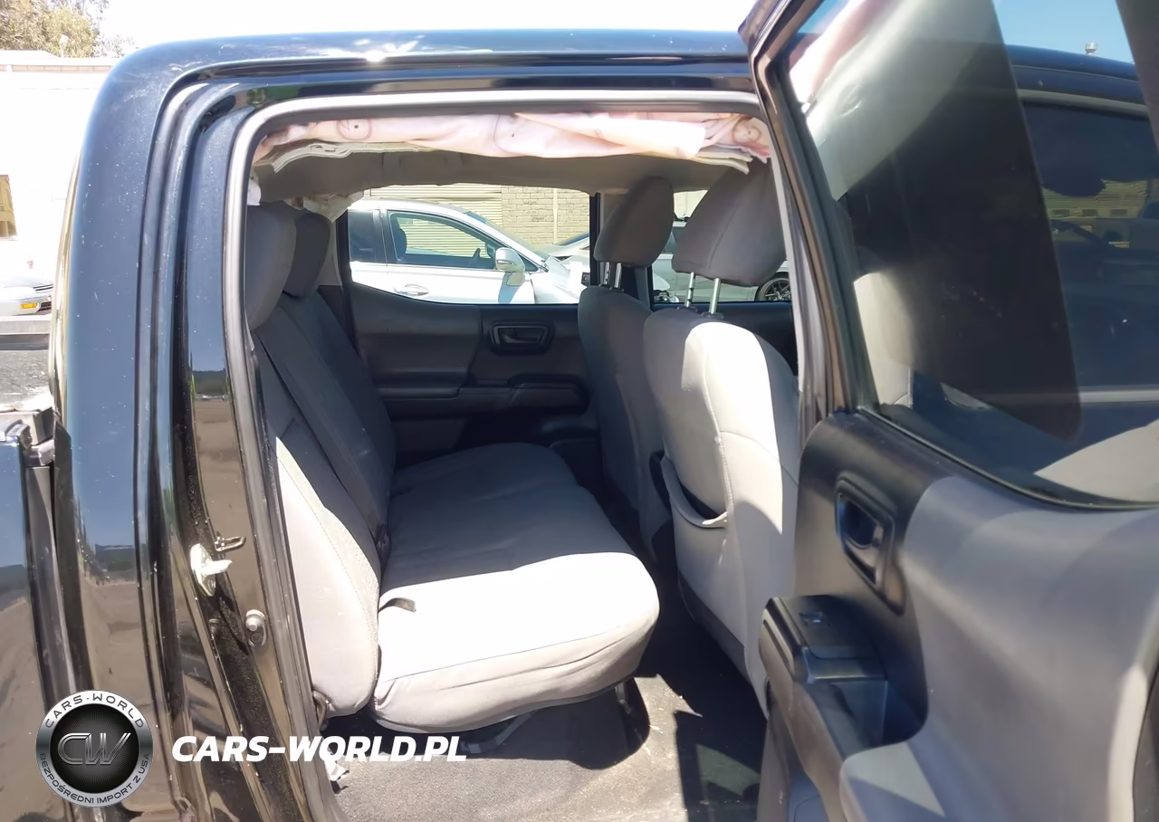 2018 Toyota Tacoma Sr VIN:5TFAX5GN3JX121175 - 8