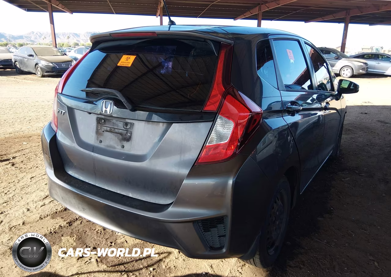 2015 Honda Fit Lx VIN:3HGGK5H51FM706052 - 4