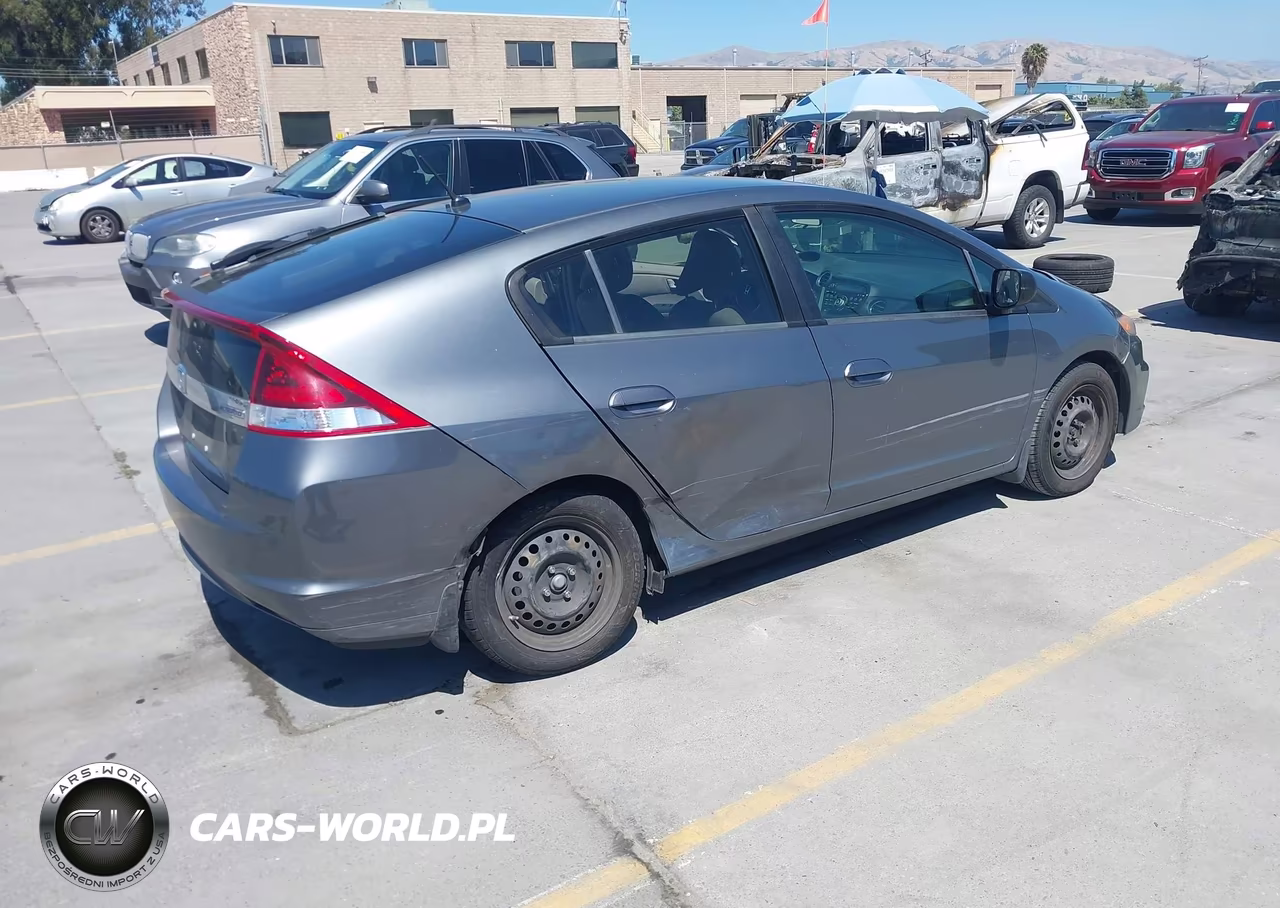 2014 Honda Insight Lx VIN:JHMZE2H52ES000418 - 4