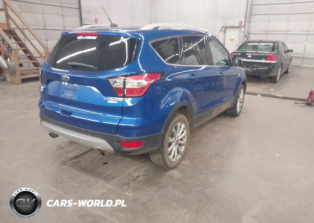 2017 Ford Escape Titanium VIN:1FMCU9JDXHUE73511 - 4
