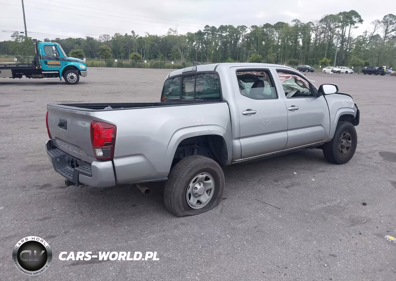 2018 Toyota Tacoma Sr VIN:5TFAX5GN2JX115383 - 4