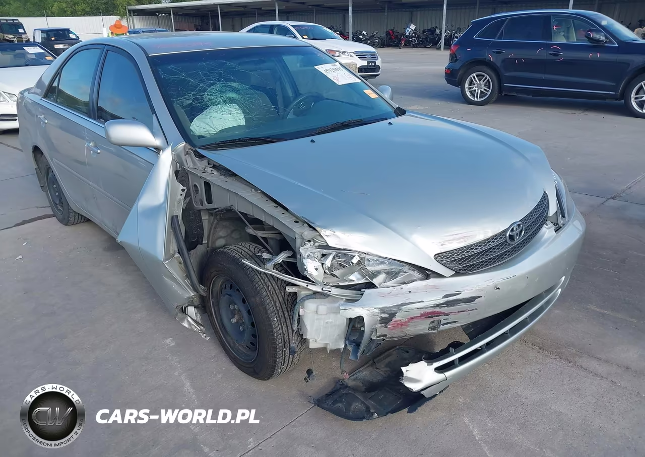 2002 Toyota Camry Le VIN:JTDBE32K020107465 - 6