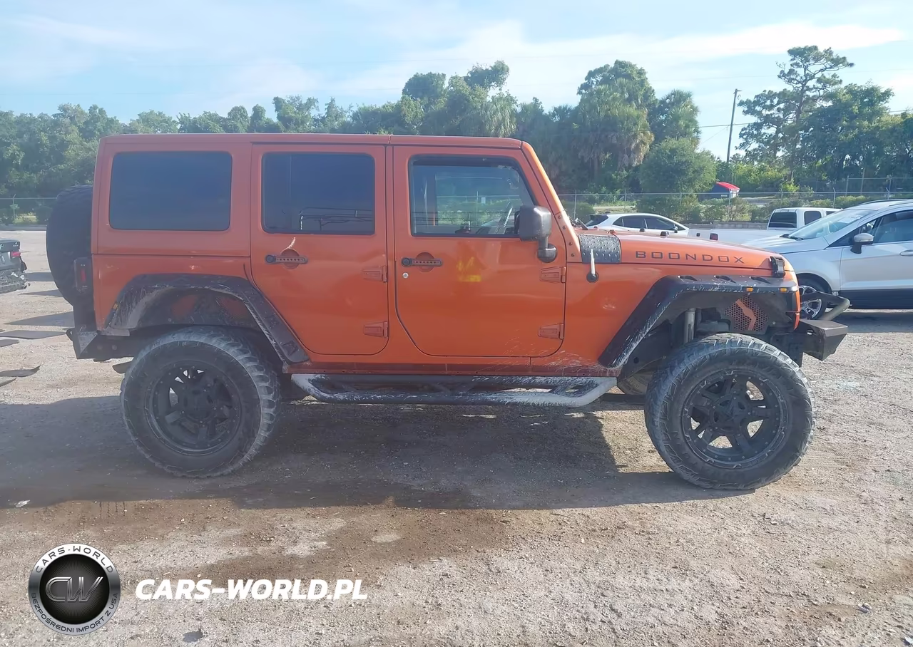 2011 Jeep Wrangler Unlimited Sahara VIN:1J4BA5H15BL632021 - 13