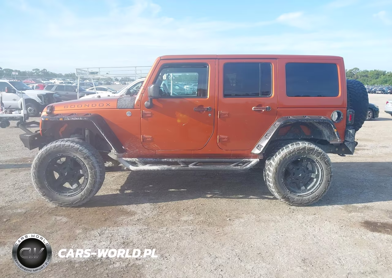 2011 Jeep Wrangler Unlimited Sahara VIN:1J4BA5H15BL632021 - 14