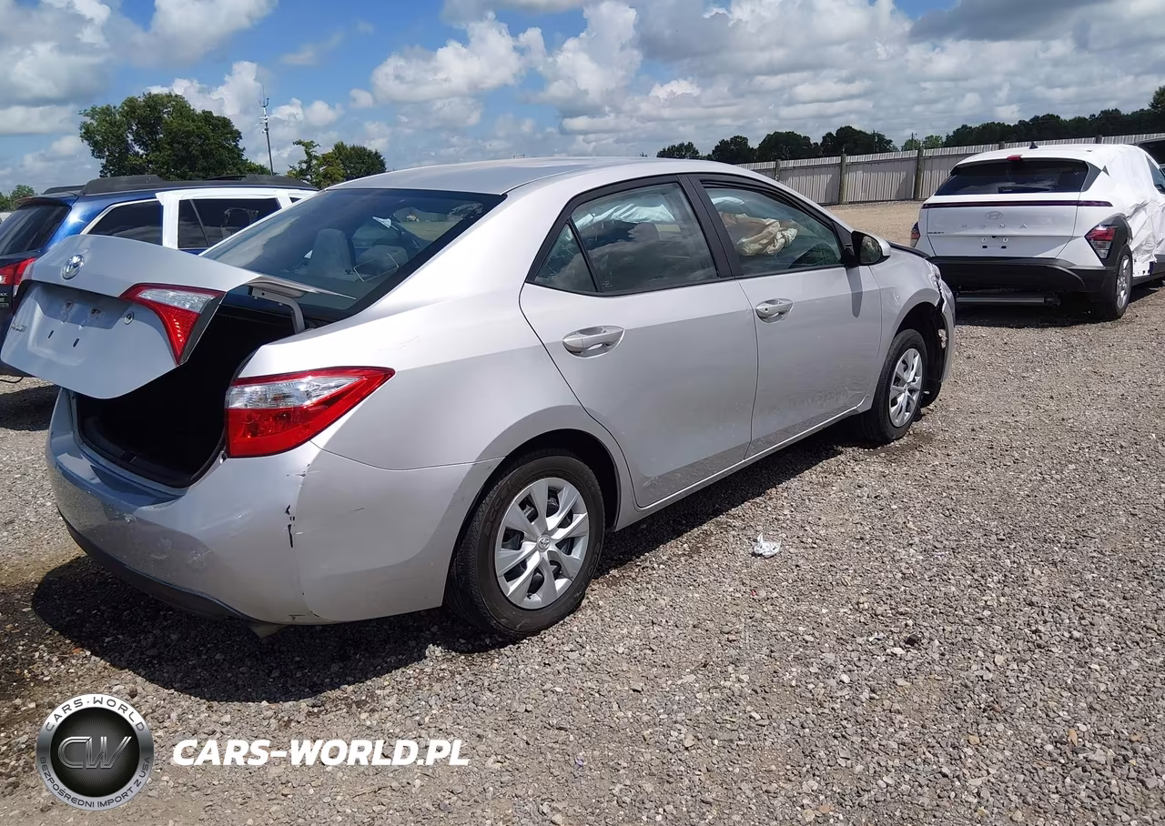 2015 Toyota Corolla L VIN:5YFBURHE2FP340704 - 4