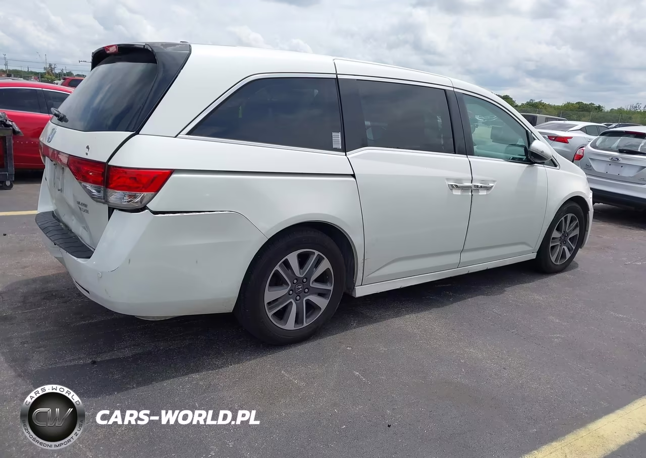 2015 Honda Odyssey Touring-Touring Elite VIN:5FNRL5H9XFB049408 - 4