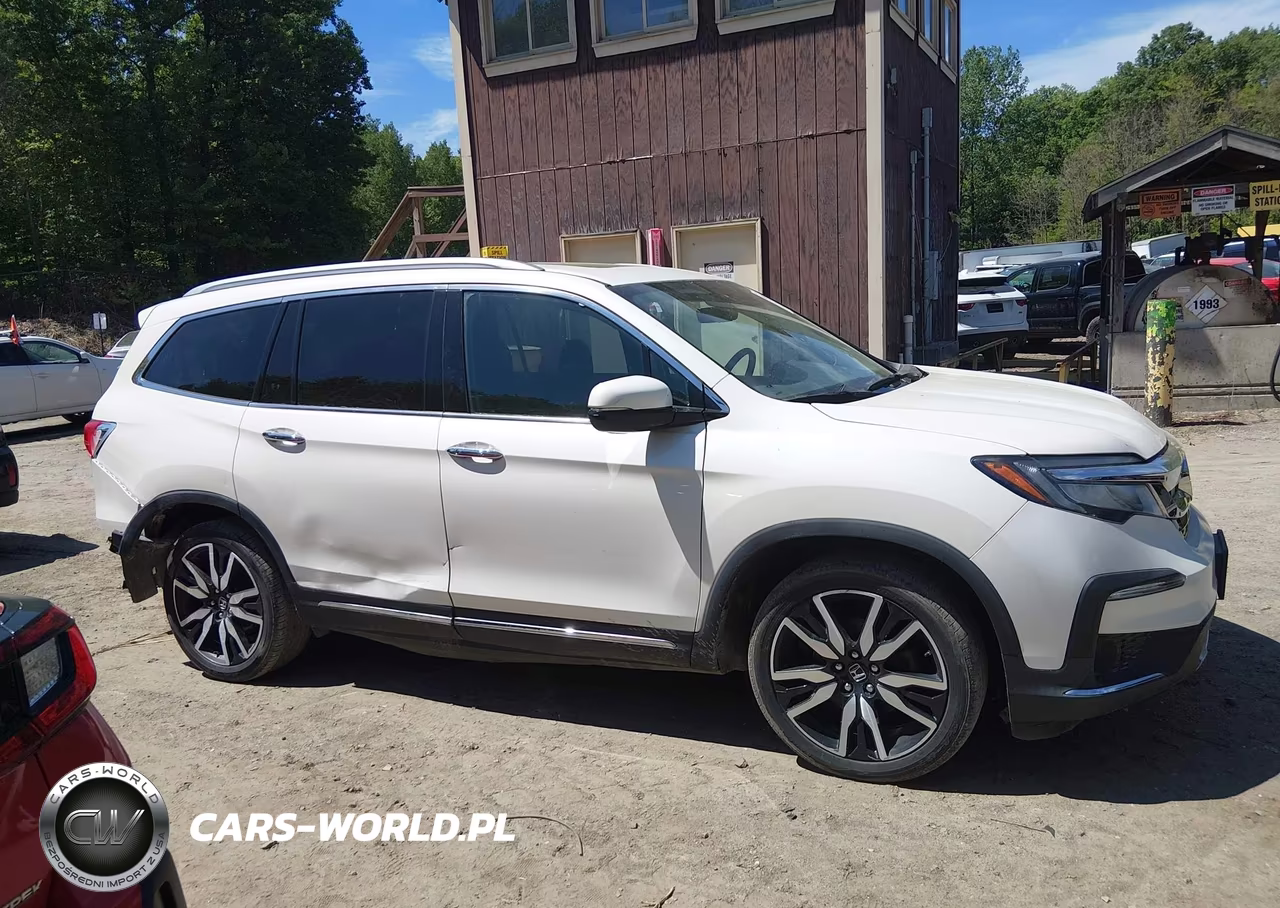2019 Honda Pilot Elite VIN:5FNYF6H09KB000124 - 13