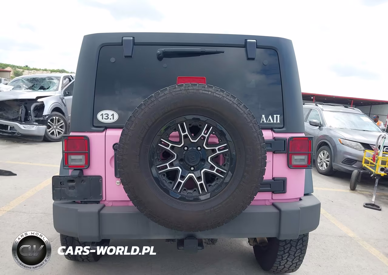 2013 Jeep Wrangler Unlimited Sport VIN:1C4BJWDG7DL543043 - 16