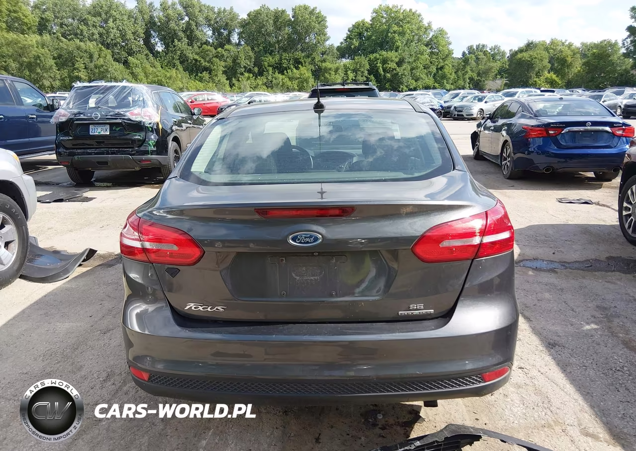 2016 Ford Focus Se VIN:1FADP3F24GL301408 - 16