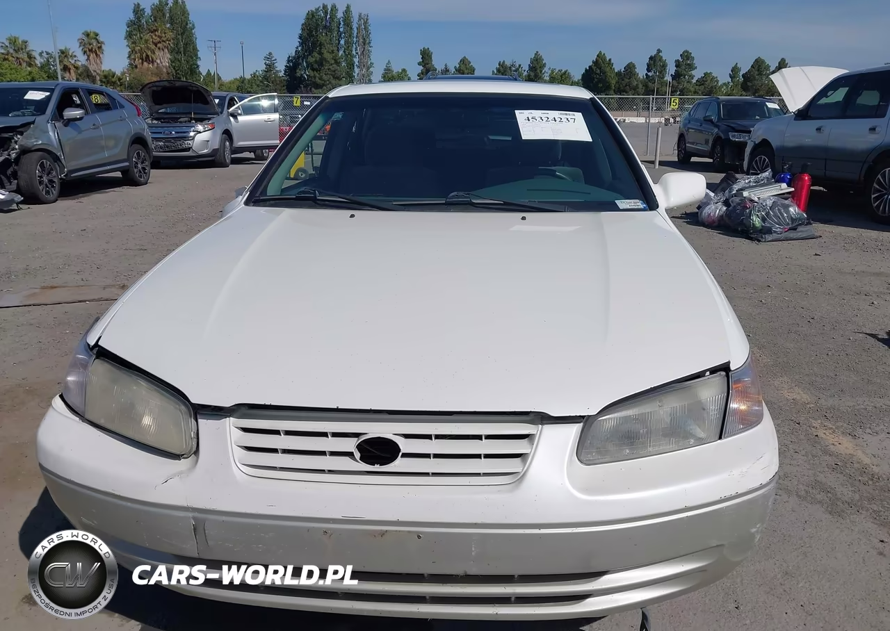 1999 Toyota Camry Le VIN:4T1BG22K0XU892392 - 12