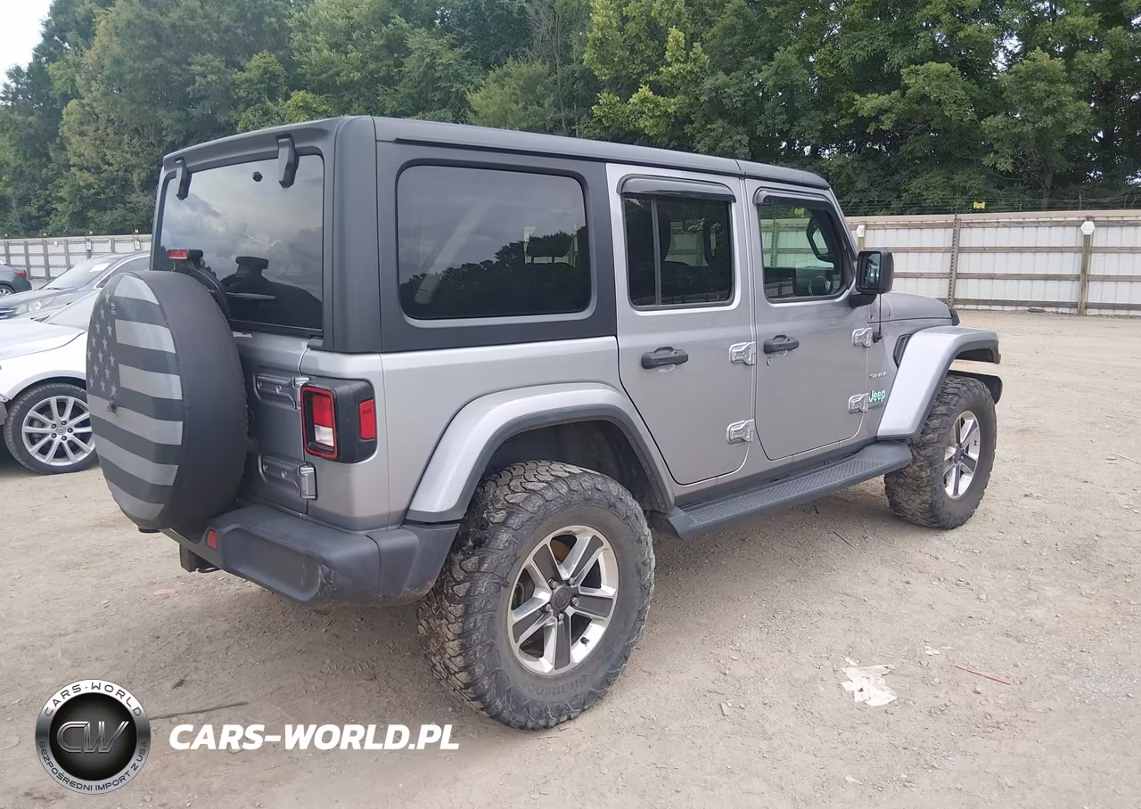 2019 Jeep Wrangler Unlimited Sahara 4X4 VIN:1C4HJXEN7KW590369 - 4