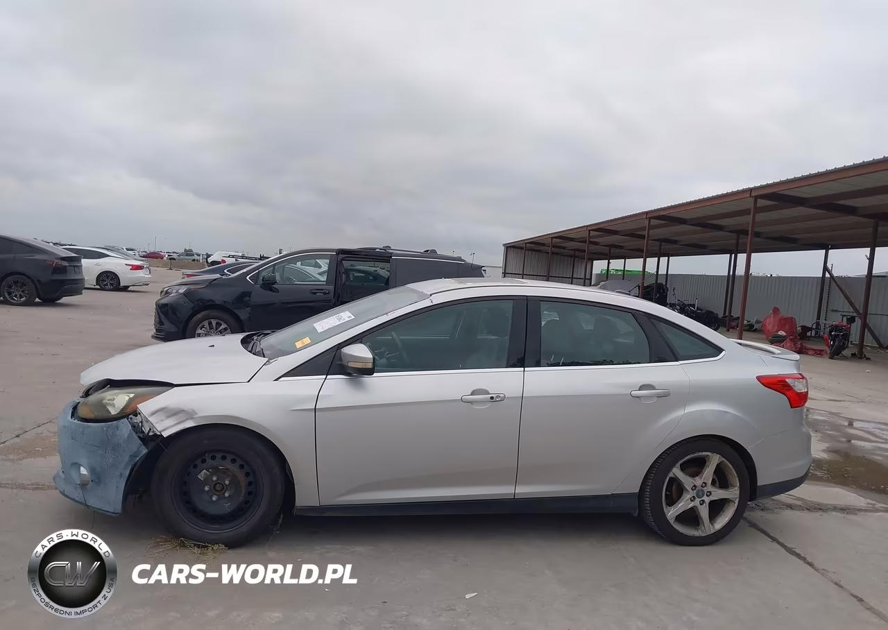 2013 Ford Focus Titanium VIN:1FADP3J28DL115258 - 14