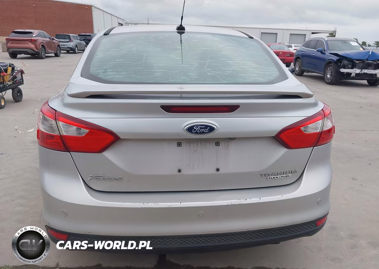 2013 Ford Focus Titanium VIN:1FADP3J28DL115258 - 16