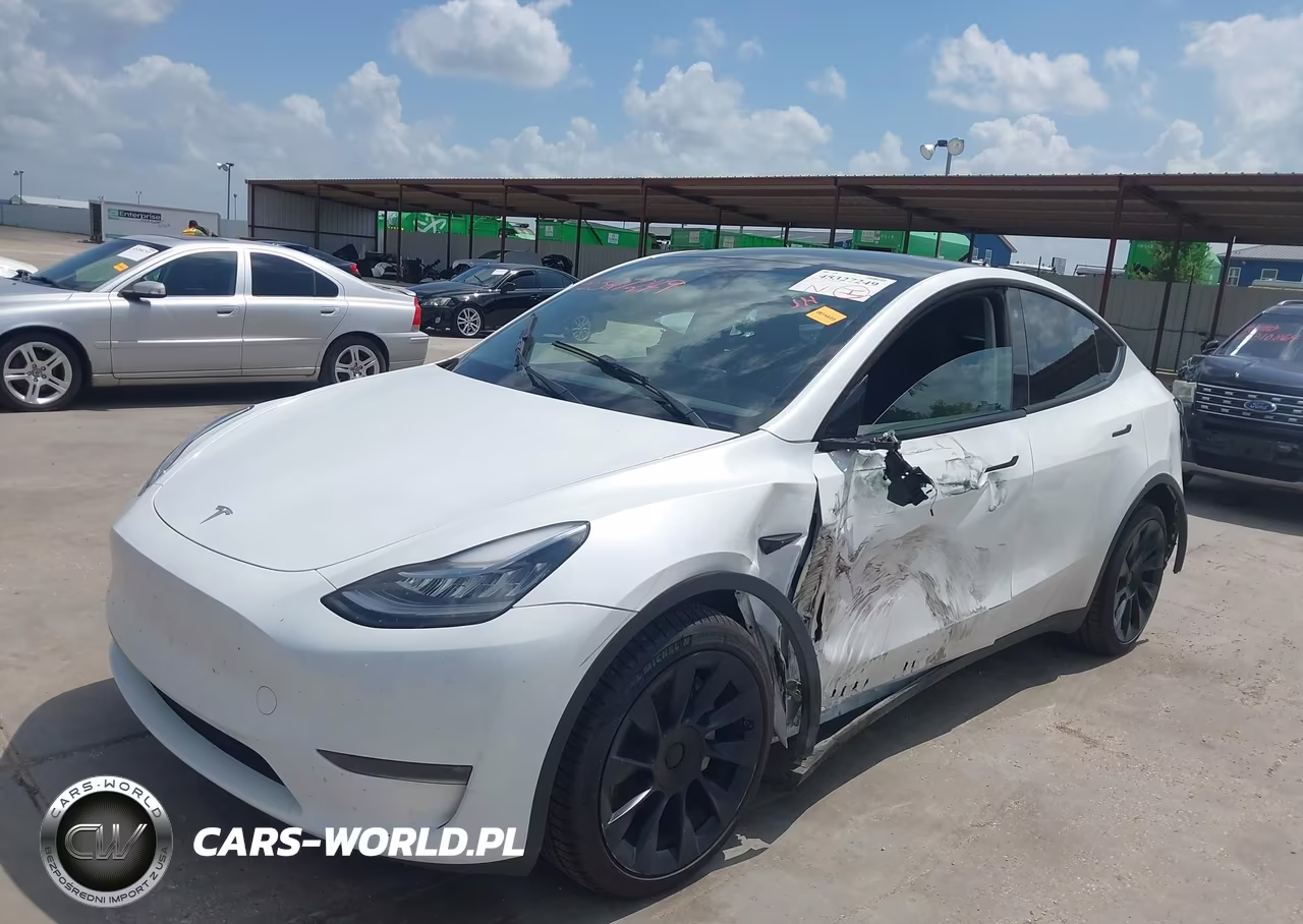 2023 Tesla Model Y Awd-Long Range Dual Motor All-Wheel Drive VIN:7SAYGDEE4PA101130 - 2