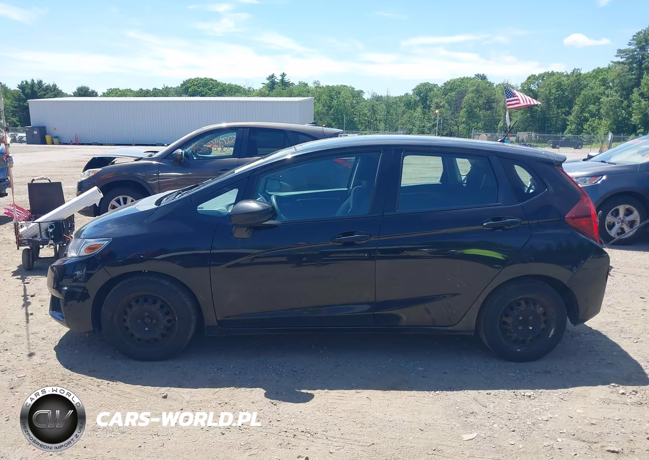 2015 Honda Fit Lx VIN:3HGGK5H58FM768015 - 15