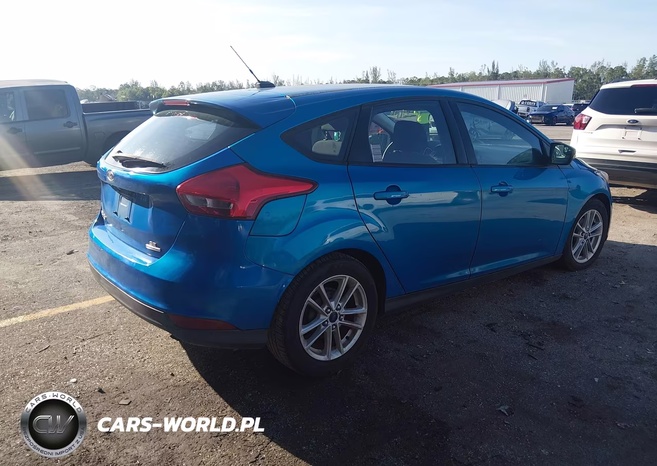 2015 Ford Focus Se VIN:1FADP3K2XFL249867 - 4