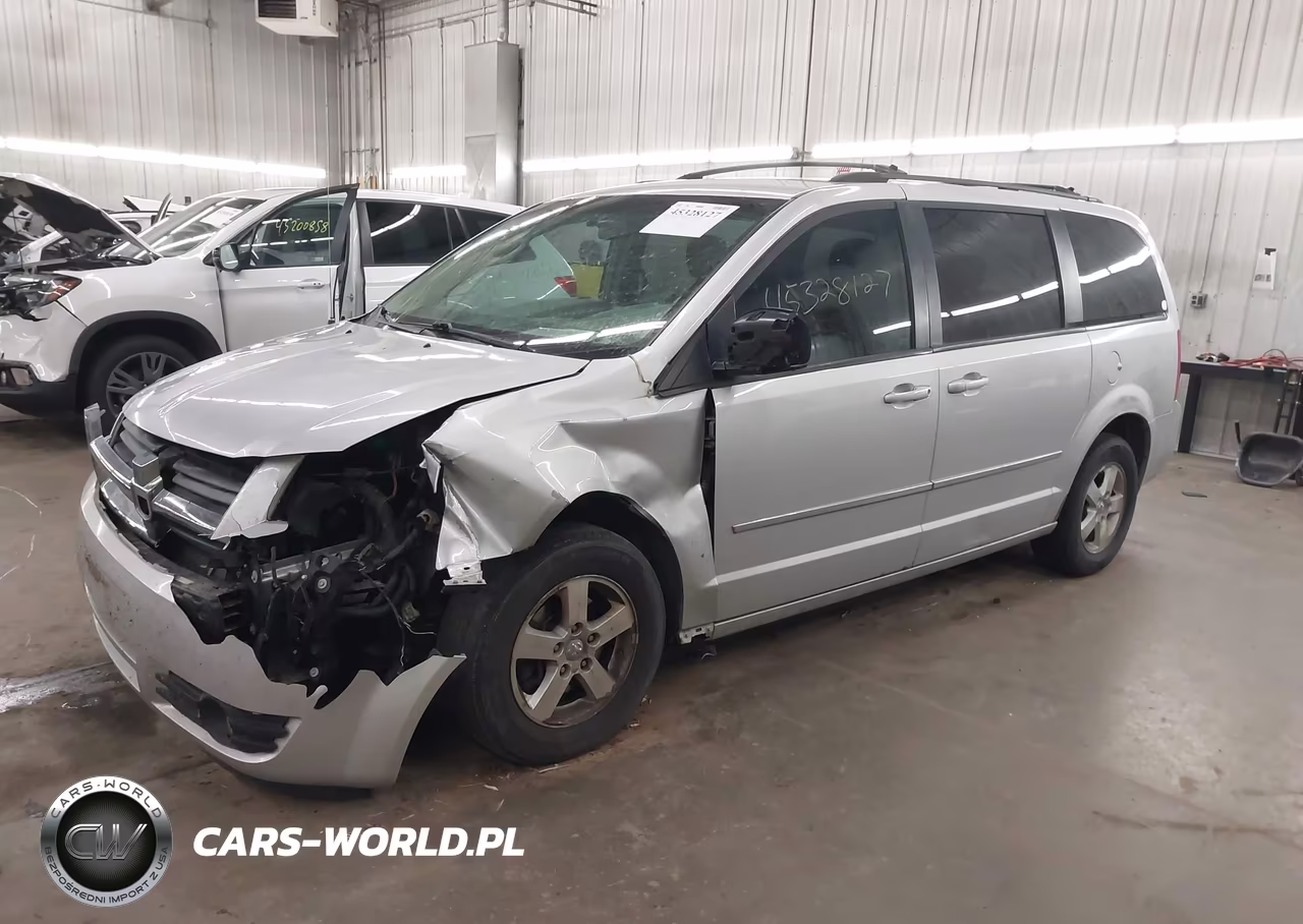 2010 Dodge Grand Caravan Sxt VIN:2D4RN5D10AR100389 - 2